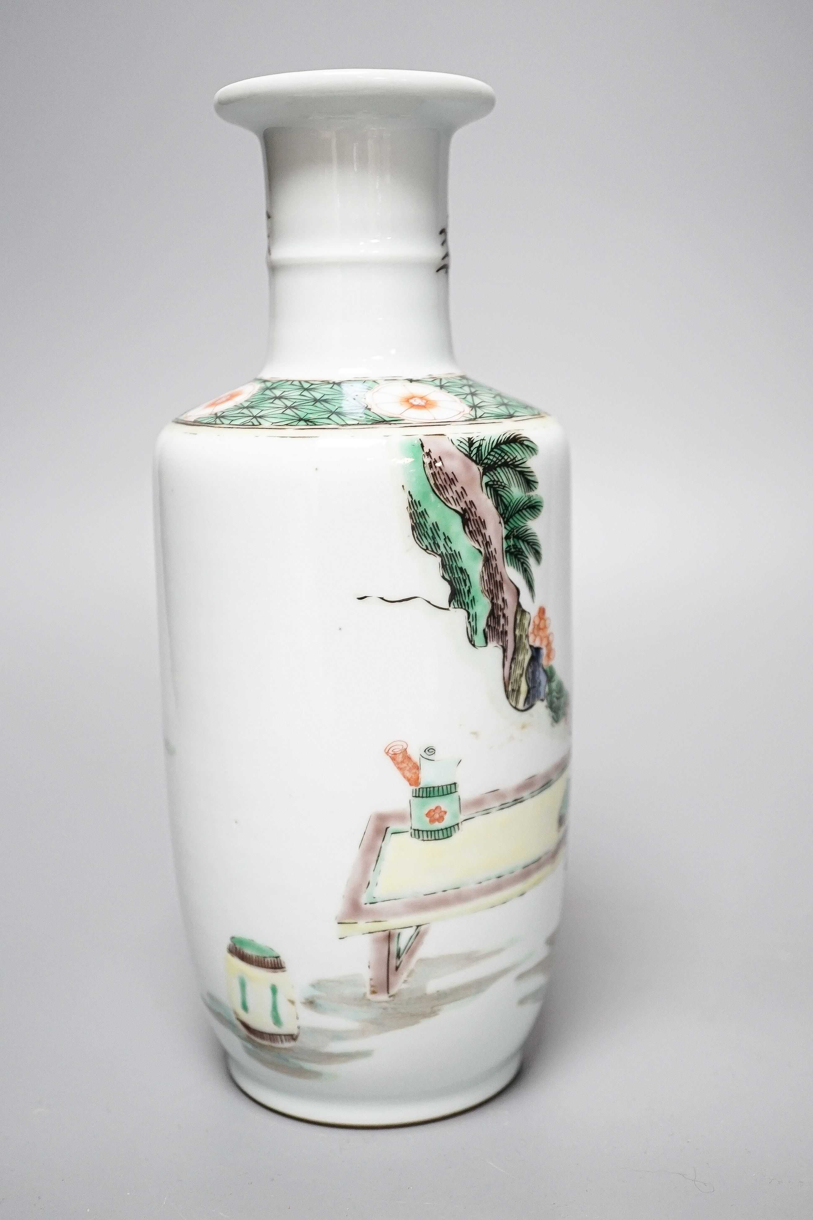 A Chinese famille verte rouleau vase, painted with figures in a garden, 22cm